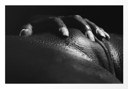 black and white image of an African woman's vulva